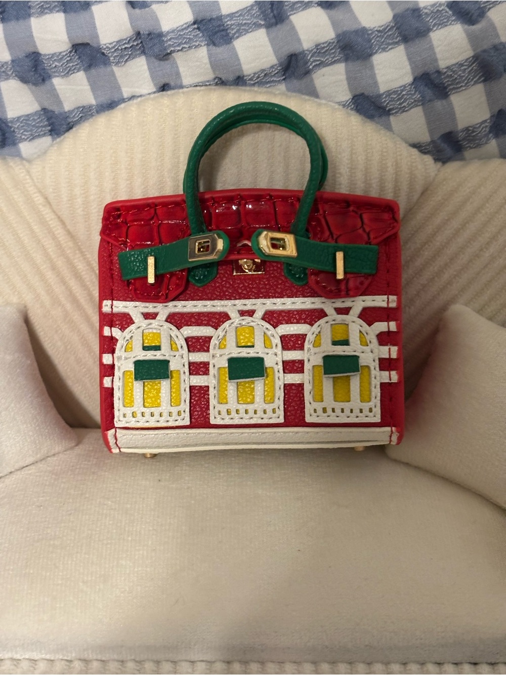 Red Mini Bag Charm with Green Handles and Yellow Accents